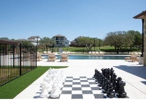 7605 Becasseau Dr, Austin, TX 78738 - community pool featuring fence and a patio area
