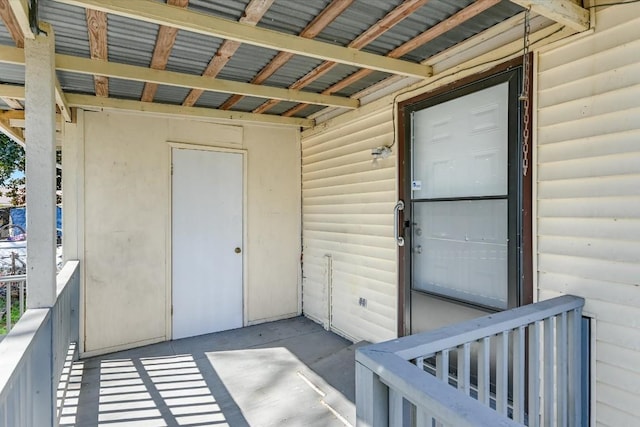 doorway to property featuring a balcony