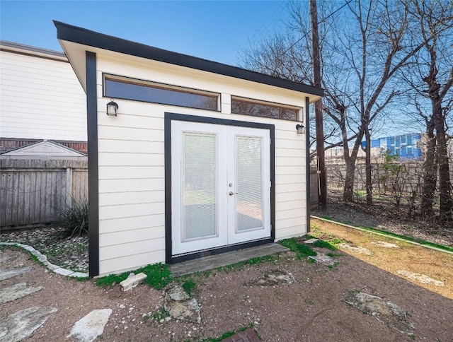 view of outbuilding featuring french doors