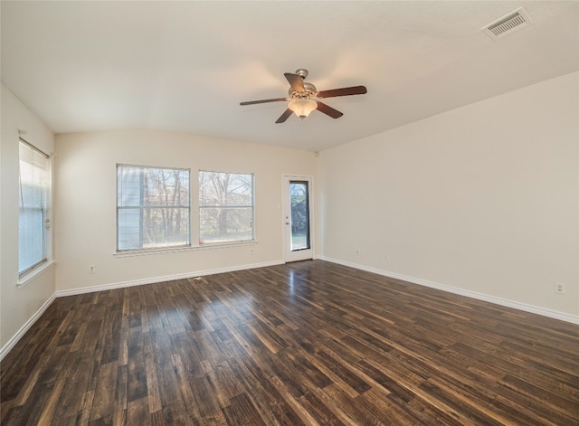 unfurnished room with ceiling fan and dark hardwood / wood-style flooring