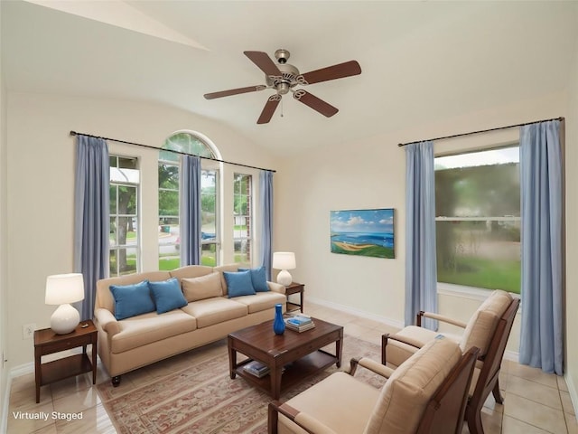 1416 Thibodeaux Dr, Round Rock, TX 78664 - living room with vaulted ceiling, a ceiling fan, light tile patterned floors, and baseboards