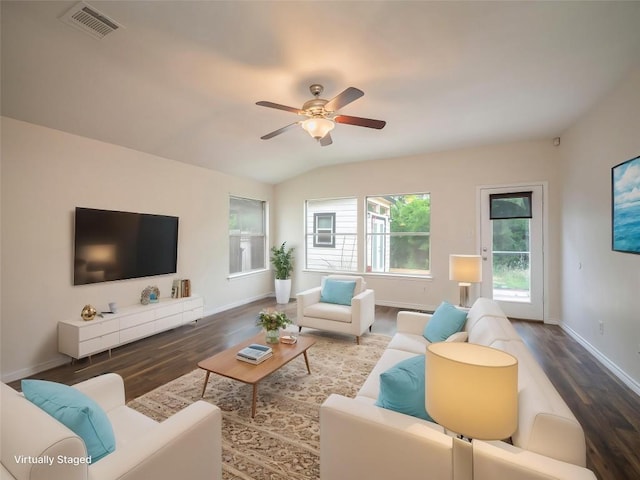 1416 Thibodeaux Dr, Round Rock, TX 78664 - living room with wood finished floors, baseboards, ceiling fan, and lofted ceiling
