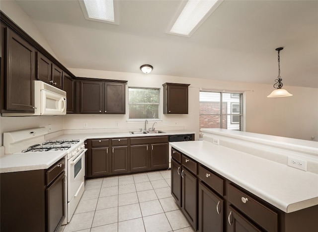 1416 Thibodeaux Dr, Round Rock, TX 78664 - kitchen featuring white appliances, a sink, dark brown cabinets, and light tile patterned flooring