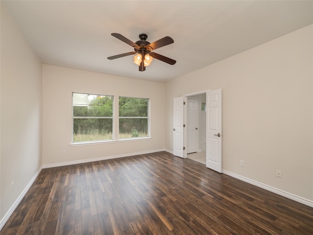1416 Thibodeaux Dr, Round Rock, TX 78664 - unfurnished room with dark wood finished floors, a ceiling fan, and baseboards
