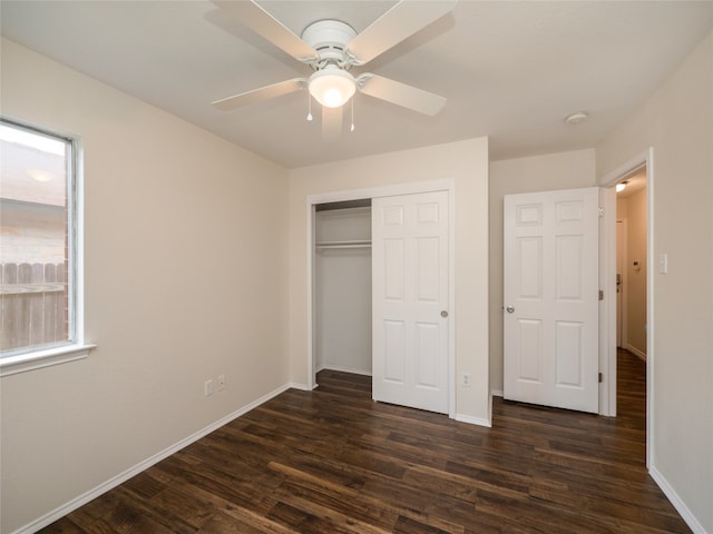 1416 Thibodeaux Dr, Round Rock, TX 78664 - unfurnished bedroom with dark wood-type flooring, a closet, baseboards, and a ceiling fan