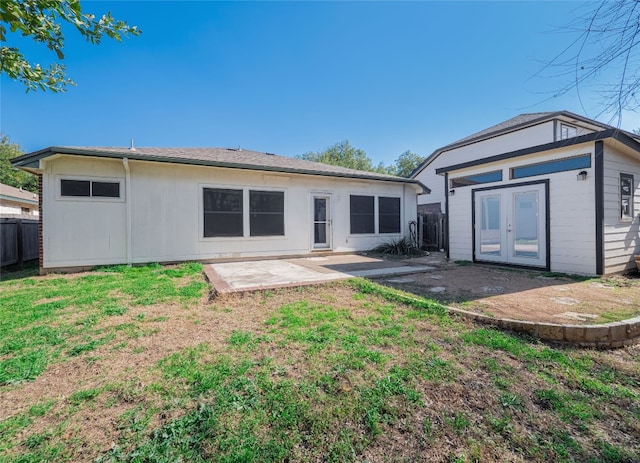 1416 Thibodeaux Dr, Round Rock, TX 78664 - rear view of house with a patio area, french doors, and an outbuilding