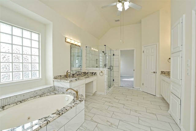 bathroom featuring ceiling fan, vanity, shower with separate bathtub, and lofted ceiling