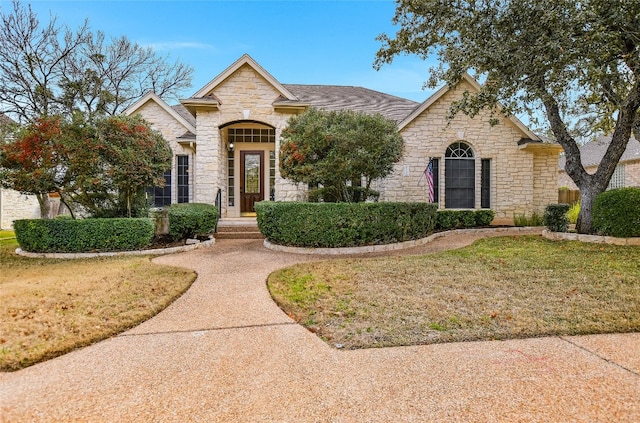 view of front of home with a front yard