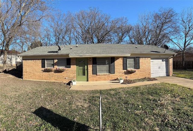 ranch-style house with a garage and a front yard