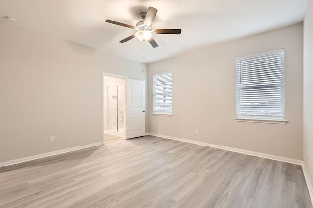 unfurnished room with ceiling fan and light hardwood / wood-style flooring