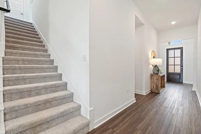 foyer entrance featuring dark hardwood / wood-style flooring