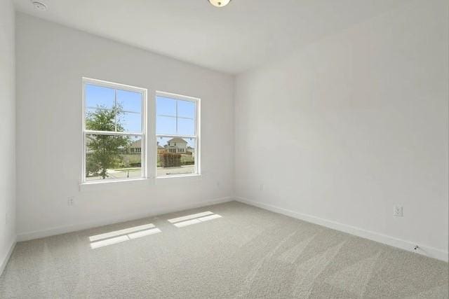 unfurnished room with carpet