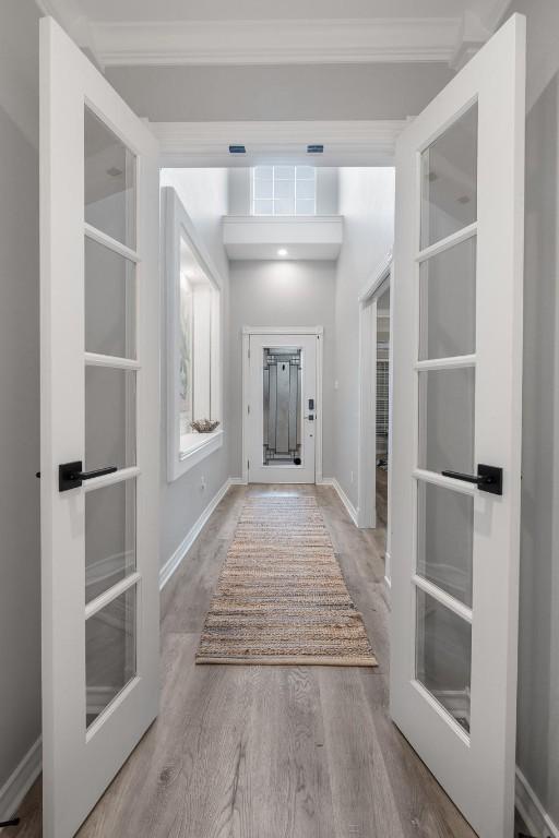 13569 Bullion Ct, Corpus Christi, TX 78418 - entryway with crown molding and wood finished floors