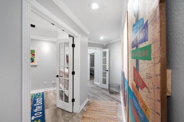 13569 Bullion Ct, Corpus Christi, TX 78418 - hall featuring french doors, wood finished floors, ornamental molding, and recessed lighting