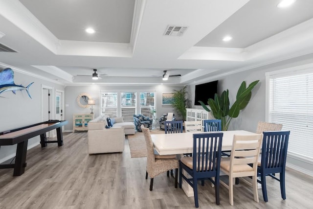 13569 Bullion Ct, Corpus Christi, TX 78418 - dining area featuring a raised ceiling, a ceiling fan, ornamental molding, recessed lighting, and light wood-type flooring