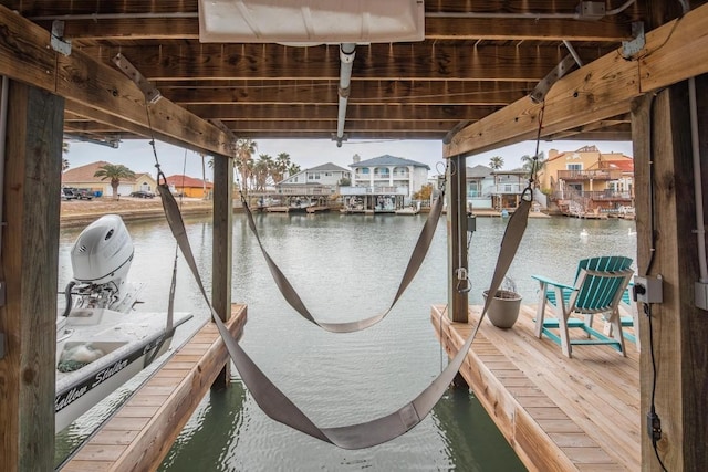 13569 Bullion Ct, Corpus Christi, TX 78418 - dock area featuring a water view, a residential view, and boat lift