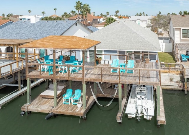13569 Bullion Ct, Corpus Christi, TX 78418 - dock area featuring boat lift and a deck with water view