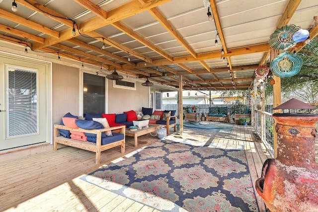 wooden deck featuring fence and outdoor lounge area