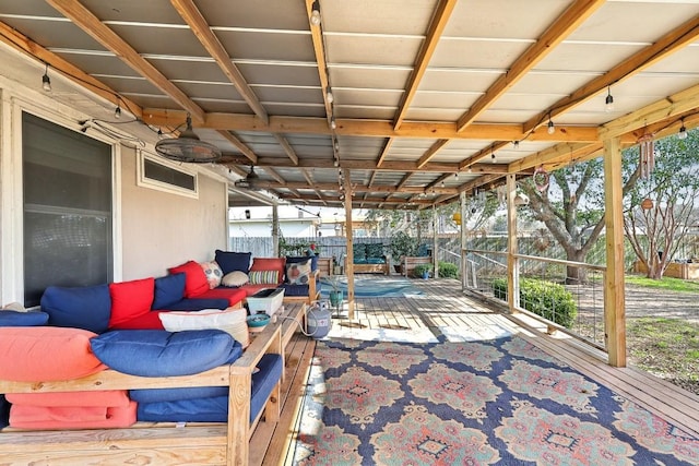 view of patio featuring fence and an outdoor living space