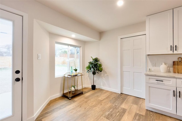 entryway with light wood-type flooring