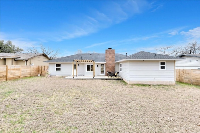 back of house featuring a patio