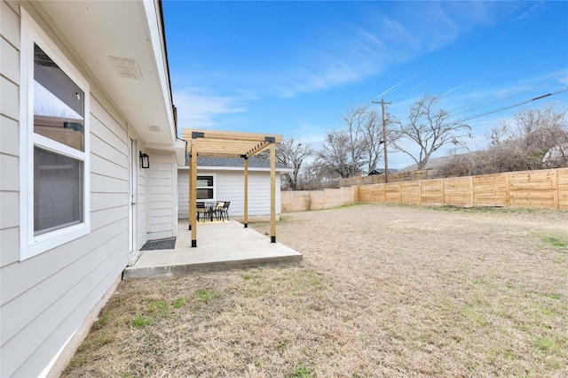 view of yard featuring a patio and a pergola