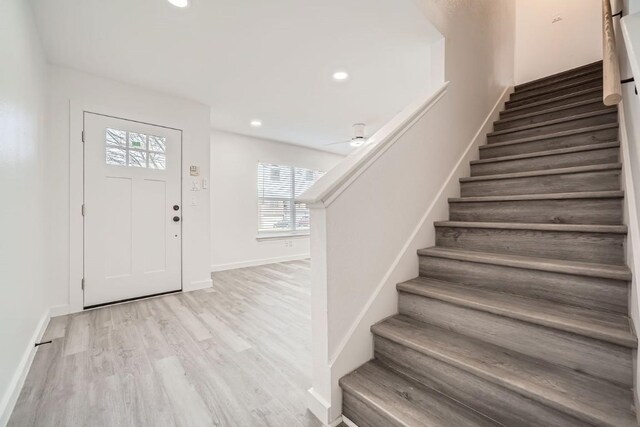 foyer entrance with light wood-type flooring