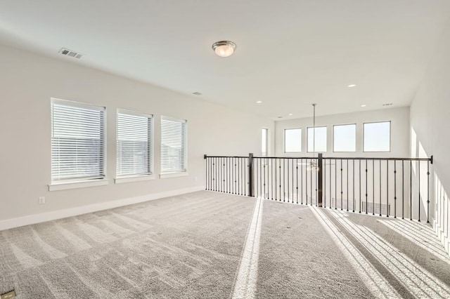 spare room featuring carpet floors