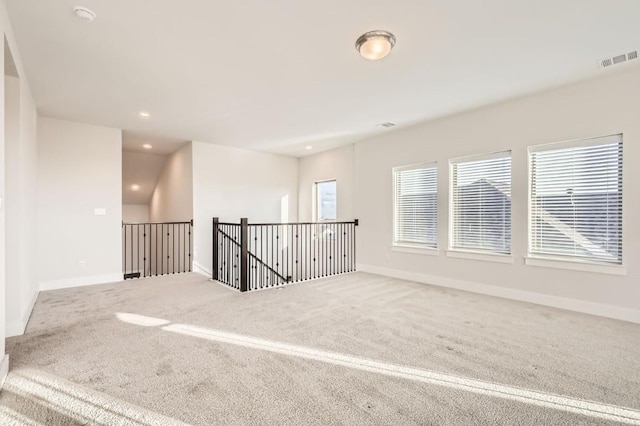 155 Cyrus Milton Dr, Buda, TX 78610 - carpeted spare room with baseboards and recessed lighting