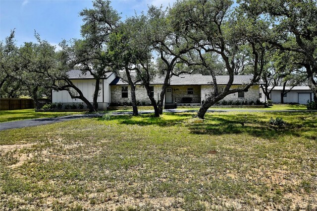 view of front of home with a front yard