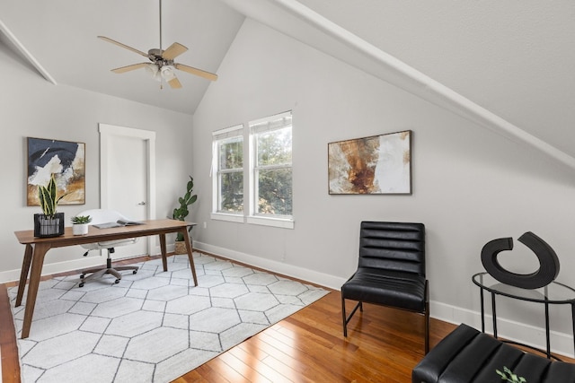 office area with hardwood / wood-style flooring, ceiling fan, and high vaulted ceiling