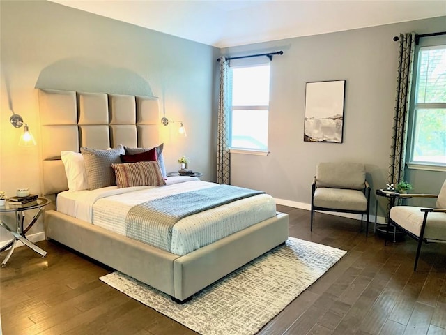 bedroom featuring dark hardwood / wood-style flooring