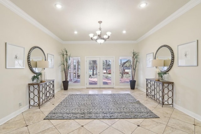 foyer entrance with crown molding, light tile patterned floors, a notable chandelier, and french doors