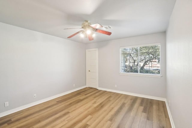 294 Logan Ranch Rd, Georgetown, TX 78628 - empty room featuring wood finished floors, baseboards, and ceiling fan