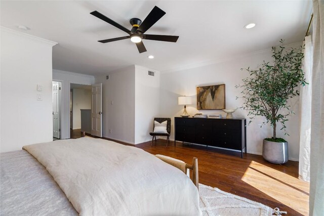 bedroom with visible vents, recessed lighting, a ceiling fan, wood finished floors, and ornamental molding