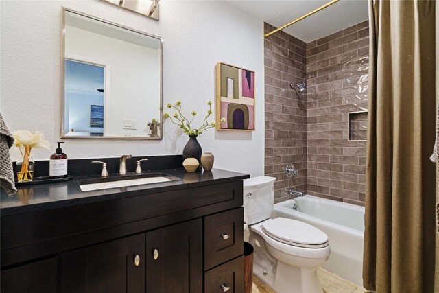bathroom with shower / bath combo with shower curtain, vanity, and toilet