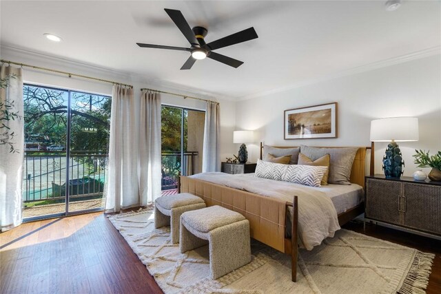 bedroom with ceiling fan, wood finished floors, access to outside, and ornamental molding