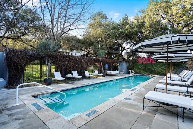 view of pool with a patio