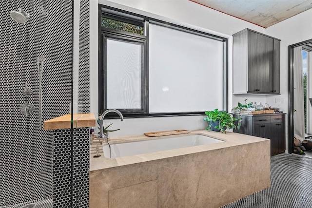 bathroom featuring plus walk in shower and vanity