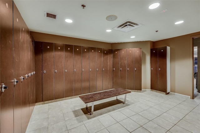 mudroom with light tile patterned floors