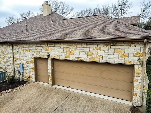 garage featuring central AC unit