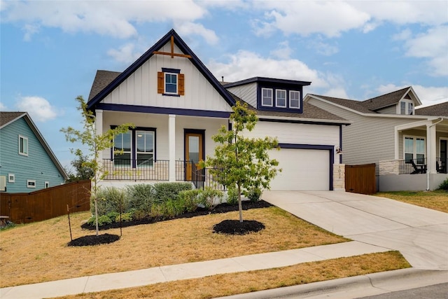 view of front of house with a garage and covered porch