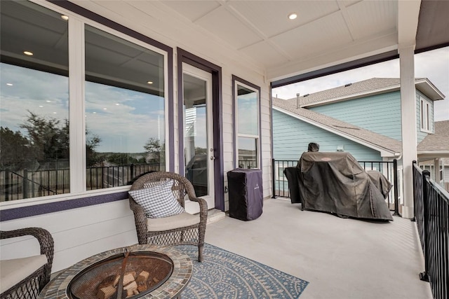 exterior space featuring area for grilling and an outdoor fire pit