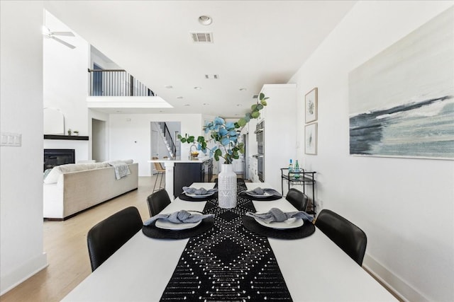 dining room with light hardwood / wood-style flooring