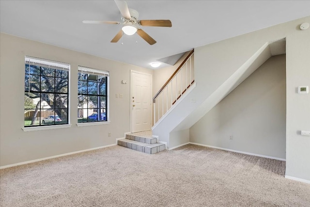 11901 Swearingen Dr Unit 37, Austin, TX 78758 - unfurnished living room featuring carpet floors, ceiling fan, and stairway