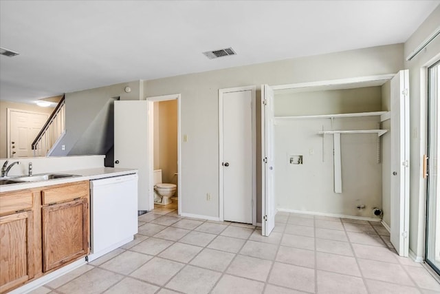 kitchen featuring sink and dishwasher