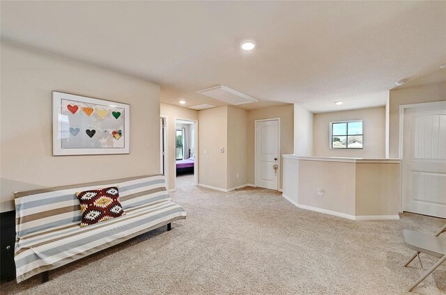 living area with carpet floors