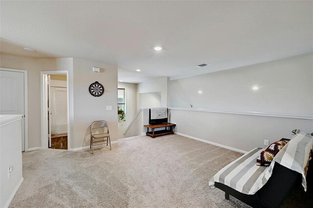 sitting room featuring carpet