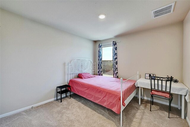 bedroom featuring carpet floors