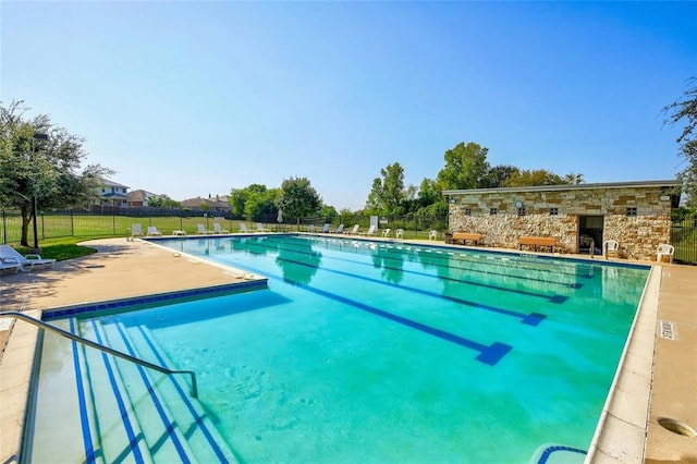 11113 Reliance Creek Dr, Austin, TX 78754 - community pool with a patio